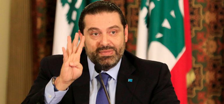 FILE PHOTO:Lebanese Prime Minister Saad al-Hariri gestures during a conference to address the results of the Paris conference, in Beirut